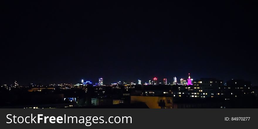 The skyline of a city at night. The skyline of a city at night.