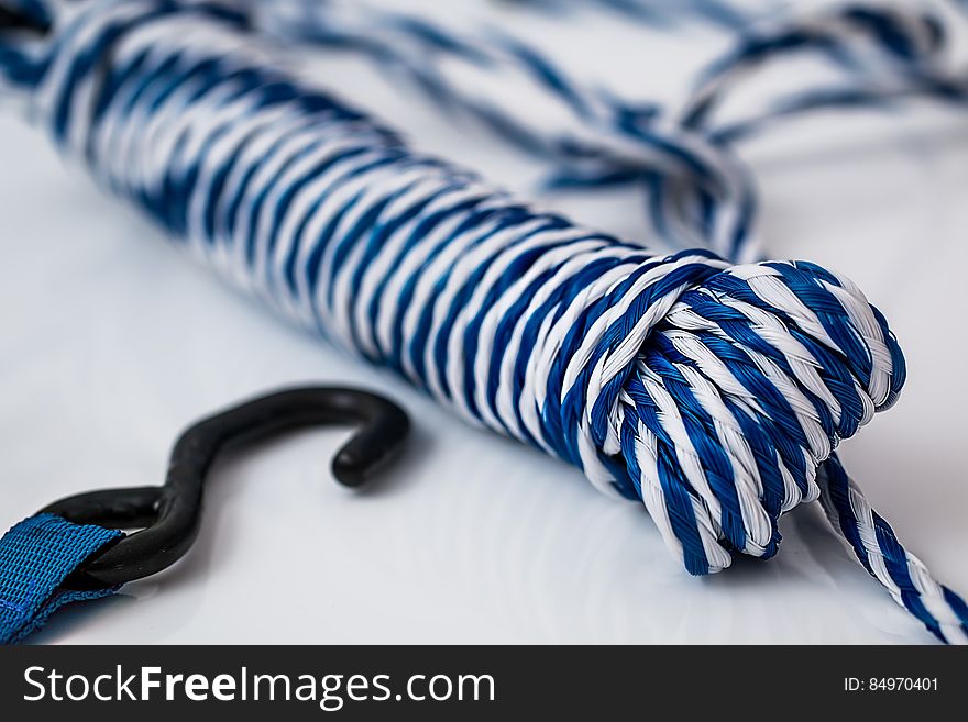Blue and White Rope in Bundle on White Table