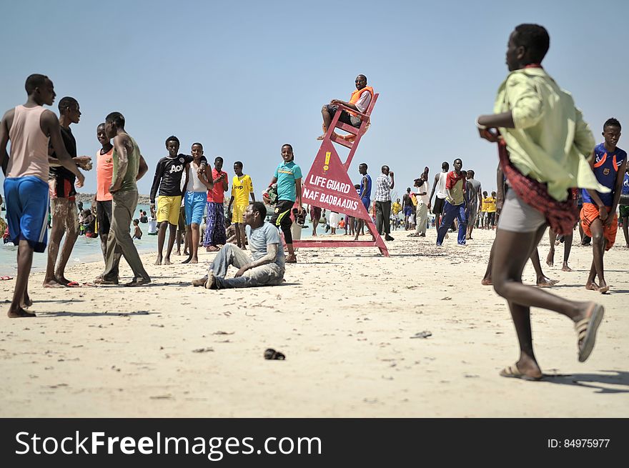 A lifeguard sits watch on LIdo beach in Mogadishu, Somalia, on January 31. The Mogadishu lifeguards, consisting entirely of a volunteer force of fisherman, began patrolling Lido beach in September 2013 after a spate of drownings. Mogadishu&#x27;s beaches have become a popular destination for the city&#x27;s residents since al Shabab withdrew the majority of its militants from the city in 2011. AU UN IST PHOTO / Tobin Jones. A lifeguard sits watch on LIdo beach in Mogadishu, Somalia, on January 31. The Mogadishu lifeguards, consisting entirely of a volunteer force of fisherman, began patrolling Lido beach in September 2013 after a spate of drownings. Mogadishu&#x27;s beaches have become a popular destination for the city&#x27;s residents since al Shabab withdrew the majority of its militants from the city in 2011. AU UN IST PHOTO / Tobin Jones