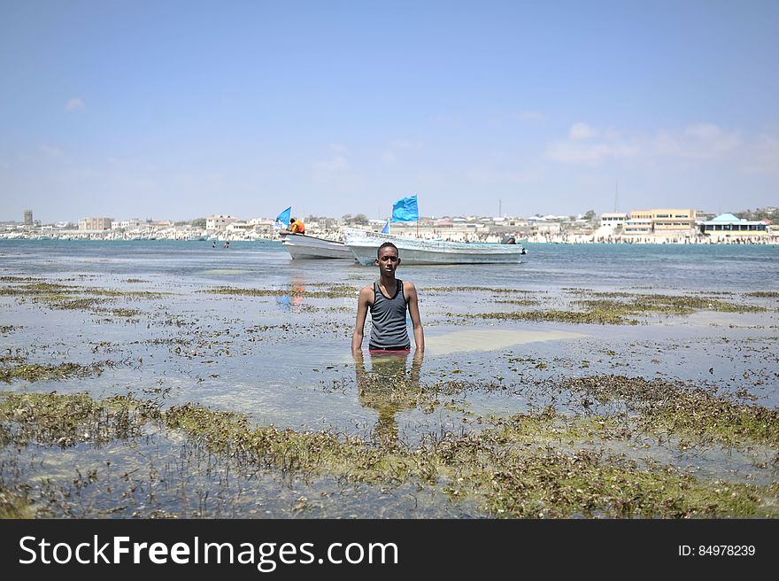A young man enjoys the waters off of Lido beach in Mogadishu, Somalia, on January 31. The Mogadishu lifeguards, consisting entirely of a volunteer force of fisherman, began patrolling Lido beach in September 2013 after a spate of drownings. Mogadishu&#x27;s beaches have become a popular destination for the city&#x27;s residents since al Shabab withdrew the majority of its militants from the city in 2011. AU UN IST PHOTO / Tobin Jones. A young man enjoys the waters off of Lido beach in Mogadishu, Somalia, on January 31. The Mogadishu lifeguards, consisting entirely of a volunteer force of fisherman, began patrolling Lido beach in September 2013 after a spate of drownings. Mogadishu&#x27;s beaches have become a popular destination for the city&#x27;s residents since al Shabab withdrew the majority of its militants from the city in 2011. AU UN IST PHOTO / Tobin Jones
