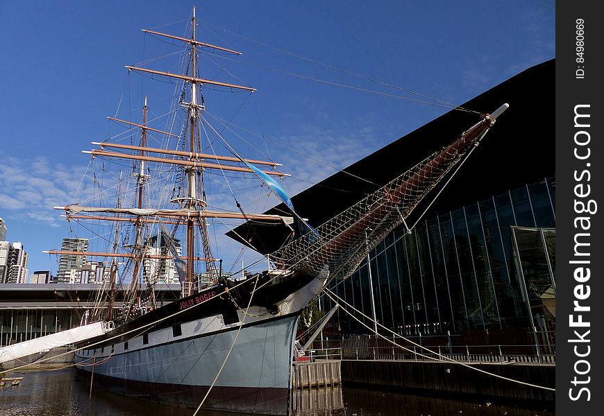 General characteristics Class and type: Cargo Type: Iron hull,Barque rig Tonnage: 678 gross Length: Hull:192.2 ft &#x28;58.6 m&#x29;LOA:230 ft &#x28;70 m&#x29; Beam: 30.15 ft &#x28;9.19 m&#x29; Height: 108 ft &#x28;33 m&#x29;&#x28;mainmast&#x29; Draught: 14 ft &#x28;4.3 m&#x29; Propulsion: Sails Speed: 14 kt Capacity: 1,100 tons Complement: less than 15 Polly Woodside is a Belfast-built, three-masted, iron-hulled barque, preserved in Melbourne, Australia, and forming the central feature of the South Wharf precinct. The ship was originally built in Belfast by William J. Woodside and was launched in 1885. Polly Woodside is typical of thousands of smaller iron barques built in the last days of sail, intended for deep water trade around the world and designed to be operated as economically as possible.