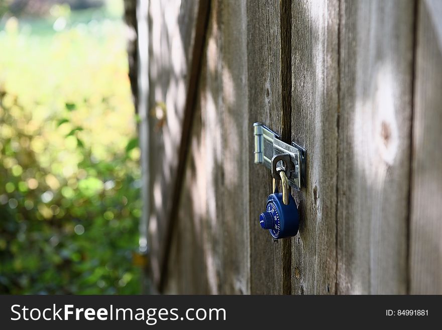 Combination Lock On Wooden Door