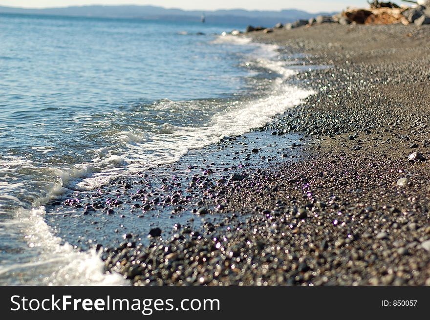 Receding waves by the beach