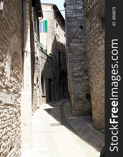 A old alley in the old part of Todi, Italy. A old alley in the old part of Todi, Italy.