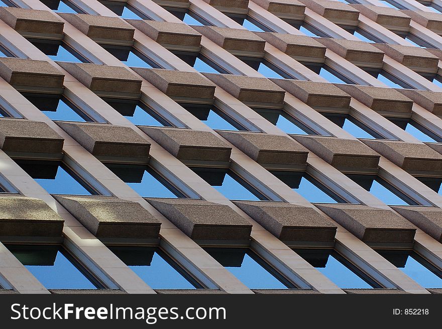 Repeated window pattern of a corporate/office building. Repeated window pattern of a corporate/office building
