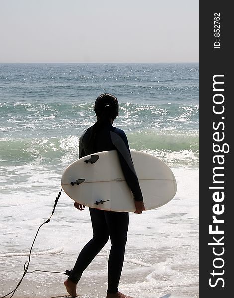 Surfer Woman next to Water. Surfer Woman next to Water