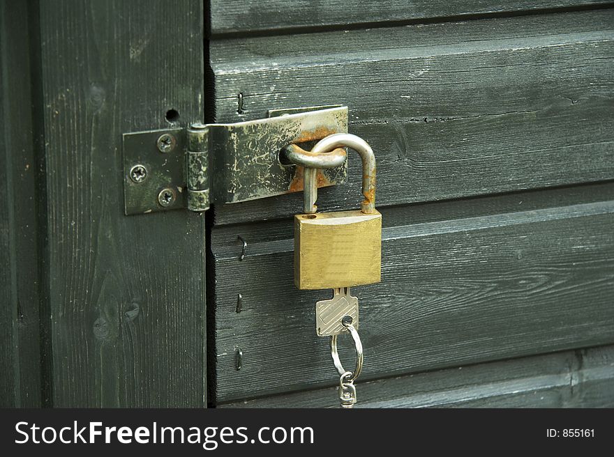 Padlock with bolt at a gate. Padlock with bolt at a gate