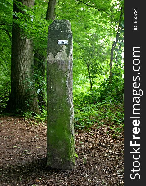 Stone border marker at the border between Germany and the Netherlands.