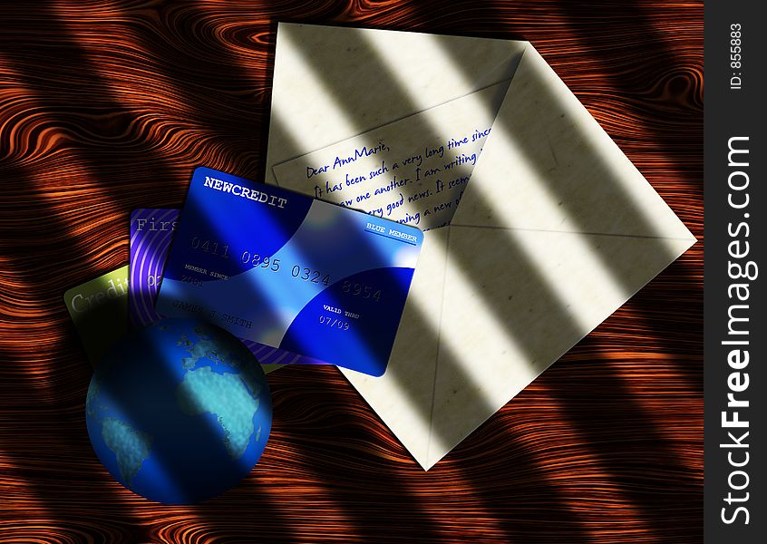 A globe of earth, a open letter and credit cards on a wooden desk. A globe of earth, a open letter and credit cards on a wooden desk