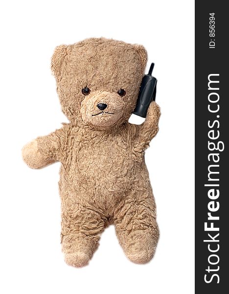 Photo of a teddybear holding a phone. Photo of a teddybear holding a phone