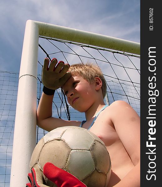 Goalkeeper, boy, hands, gloves, football, sky, blue. Goalkeeper, boy, hands, gloves, football, sky, blue