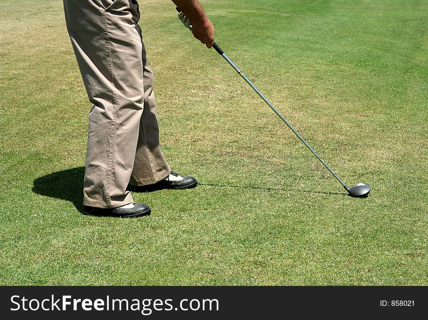 Golfer putting