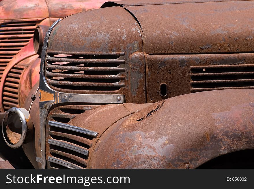 The front end of a couple of wonderful old trucks.