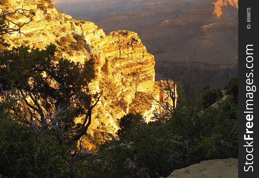 Glowing walls of the Grand Canyon at sunrise. Glowing walls of the Grand Canyon at sunrise