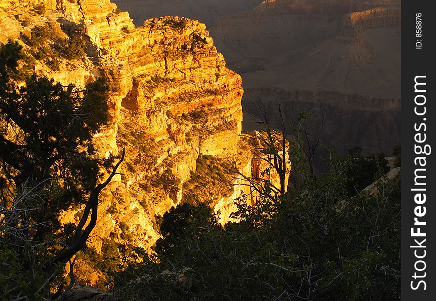 Glowing cliff in the Grand Canyon at sunrise. Glowing cliff in the Grand Canyon at sunrise