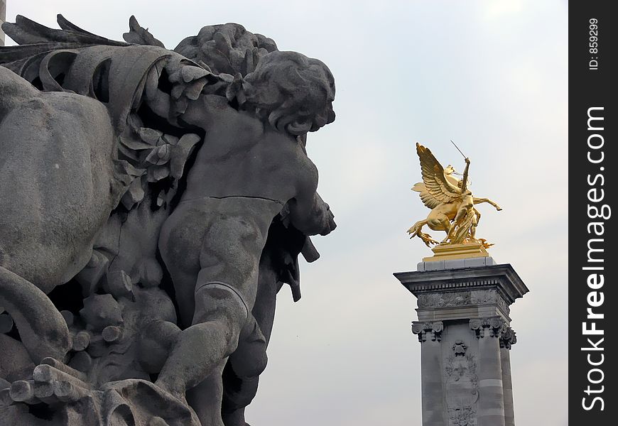Sculptures at  Alexandre III bridge in Paris. Sculptures at  Alexandre III bridge in Paris