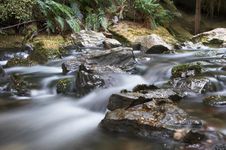 River With Rocks And Milky Water Stock Photography River With Rocks And Milky Water Stock Photography