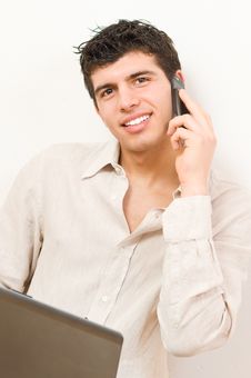 Young Man On Laptop And Mobile Stock Images Young Man On Laptop And Mobile Stock Images