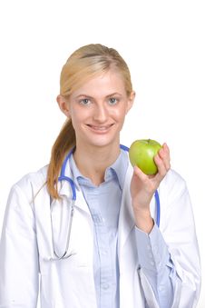 Woman Doctor Holding An Apple Stock Image Woman Doctor Holding An Apple Stock Image