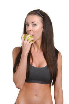 Fitness Woman Biting An Apple Stock Photos Fitness Woman Biting An Apple Stock Photos