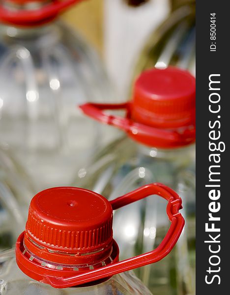 Large bottle of water with red cap. Large bottle of water with red cap