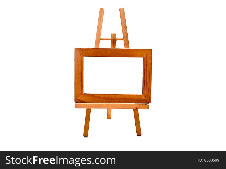 Wooden easel with empty foto frame