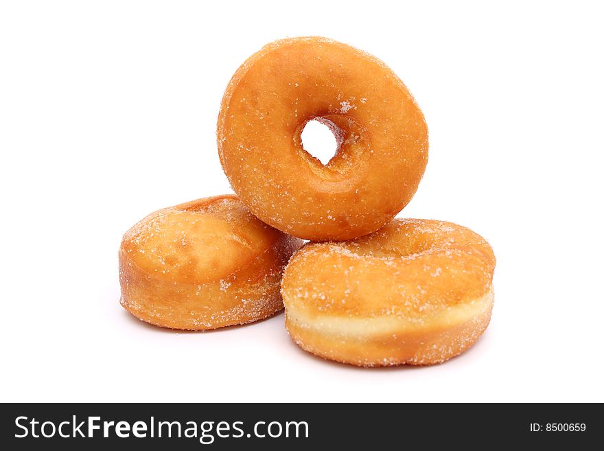 Three sweet donuts isolated on white background.