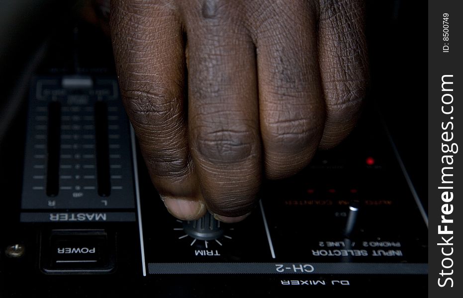 Hand Of The Dj On The Mixer