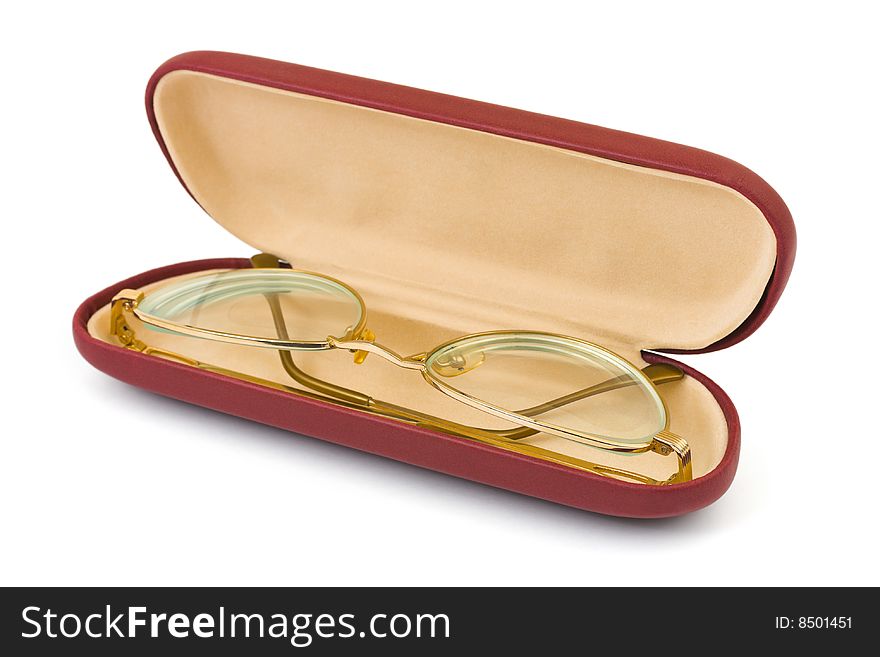 Retro golden glasses in case isolated on white background