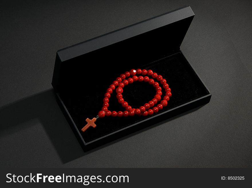 Red coral necklace with black casket