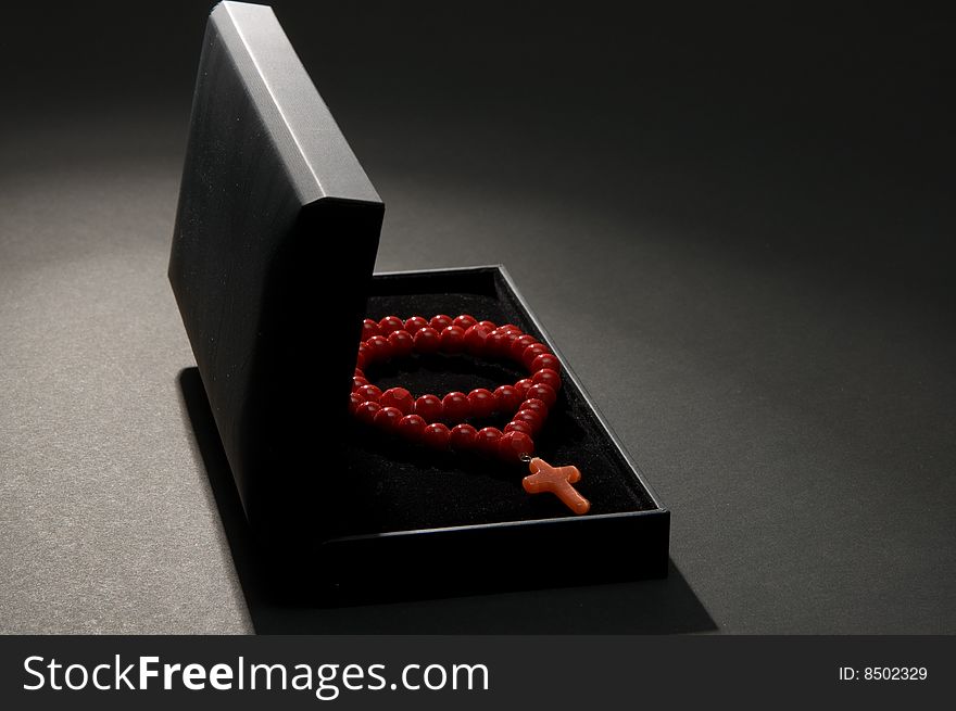 Red coral necklace with black casket