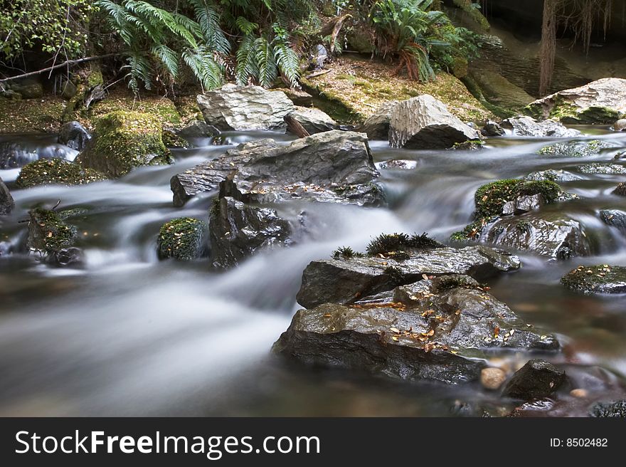 River with rocks and milky water