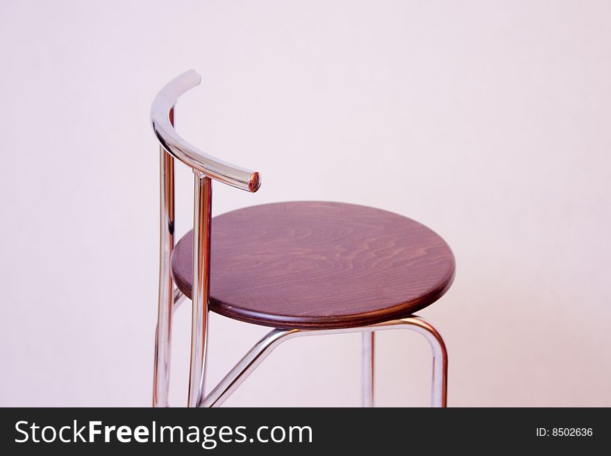 Stool over white in the studio