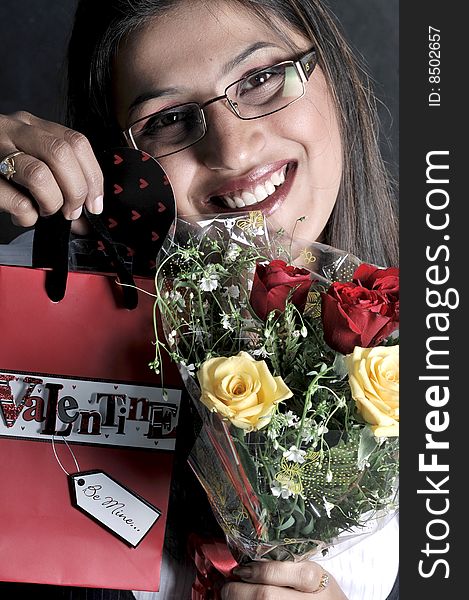 Girl with flower and bag.