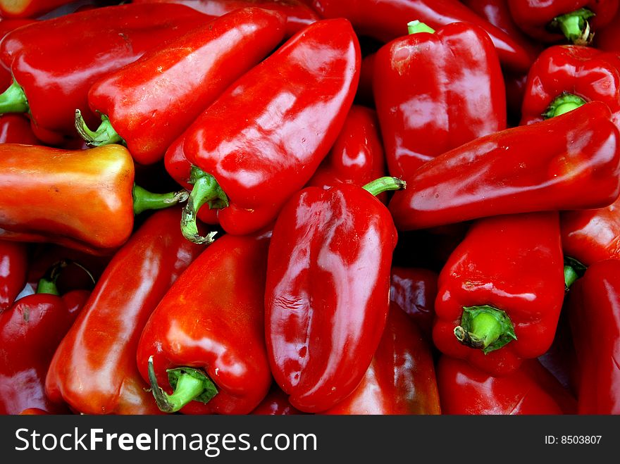 A display of shiny, sweet, red peppers at the Tian Fu outdoor marketplace in Pengzhou, Sichuan province, China - Lee Snider Photo. A display of shiny, sweet, red peppers at the Tian Fu outdoor marketplace in Pengzhou, Sichuan province, China - Lee Snider Photo.