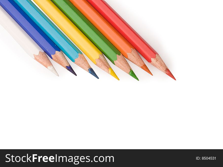 Coloured pencils isolated on white background