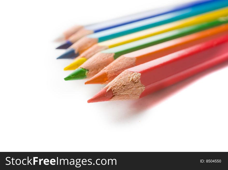 Coloured pencils isolated on white background