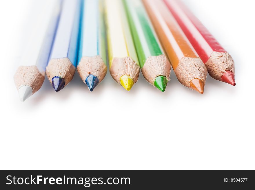 Coloured pencils isolated on white background