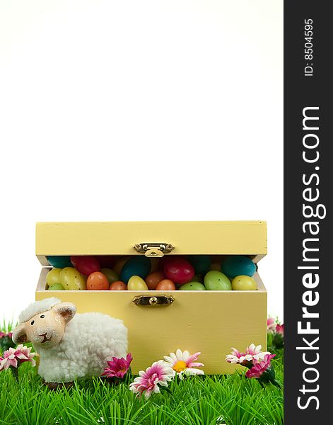 Box of easter eggs and cute sheep