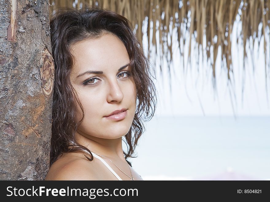 Portrait of a young gorgeous female in tropical environment. Portrait of a young gorgeous female in tropical environment