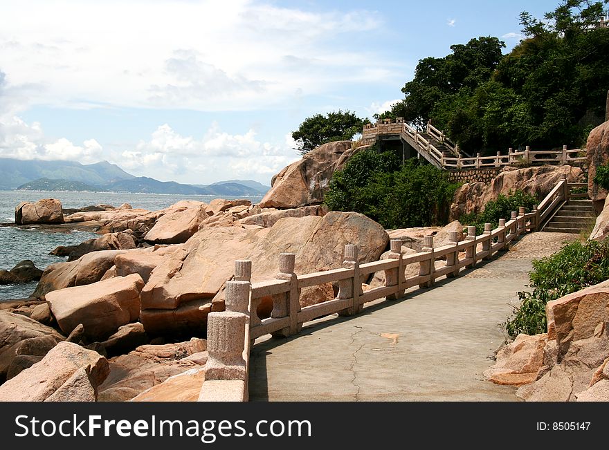 This is a lover`s road beside ocean.It goes around an island named Wai LingDing, near Hongkong, China.