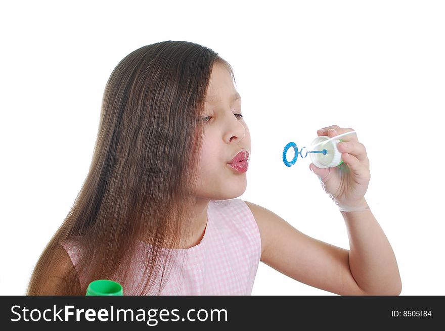 The portrait of little cute girl with soap-bubble