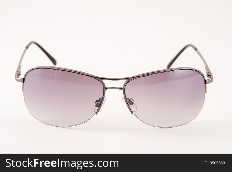 Modern sunglasses isolated on white