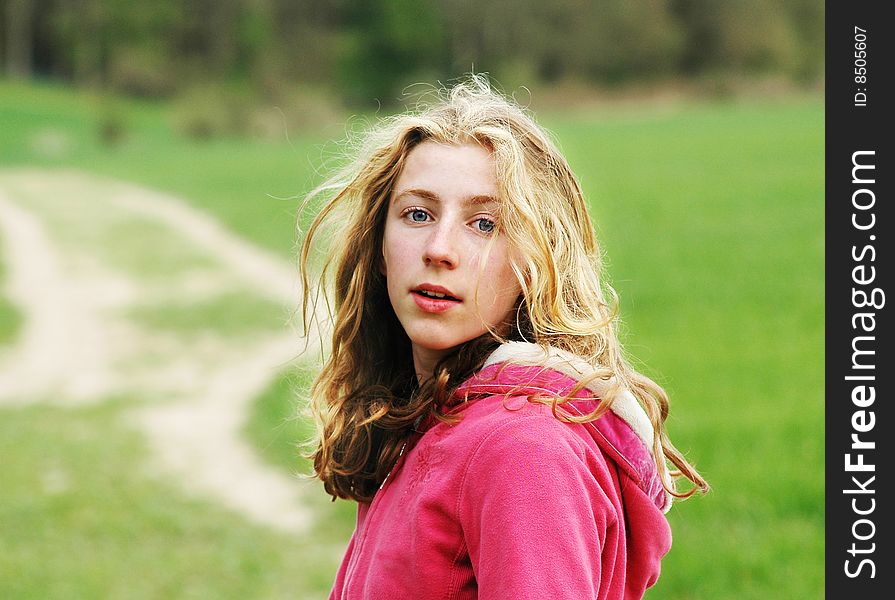 Pretty teenage girl in the countryside