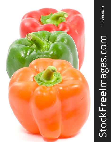 Close up on colorful paprika on white background