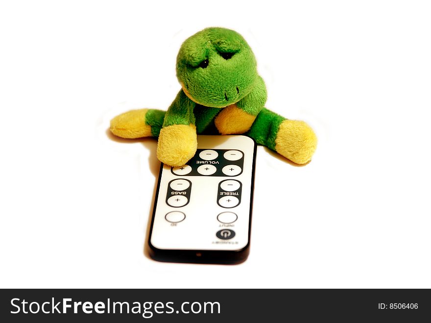 Fun frog with remote control isolated on a white background. Fun frog with remote control isolated on a white background