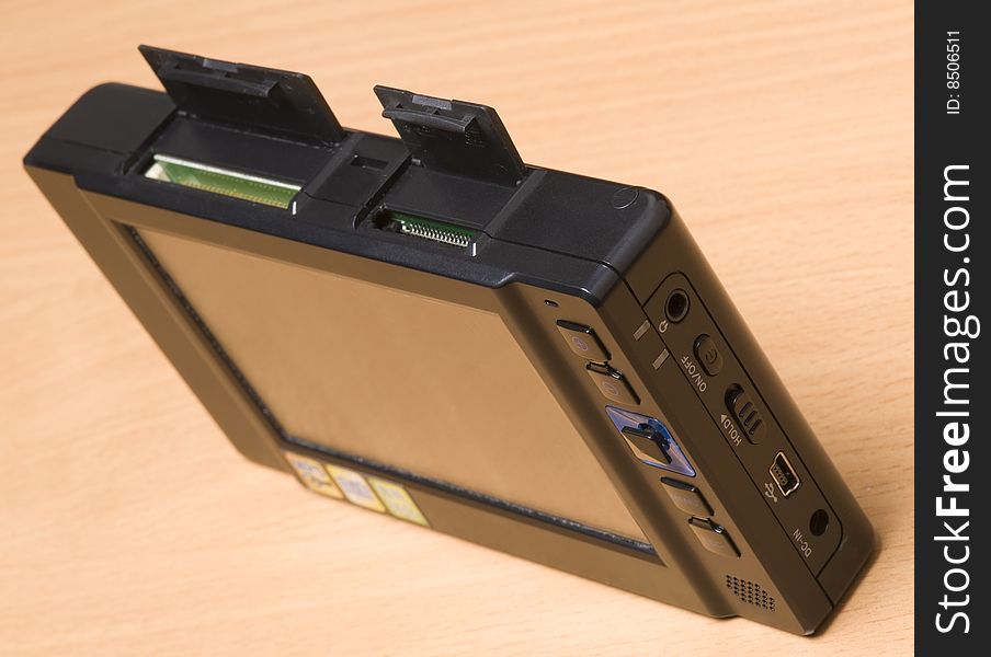 A all-in-1 mobile card reader is on table.