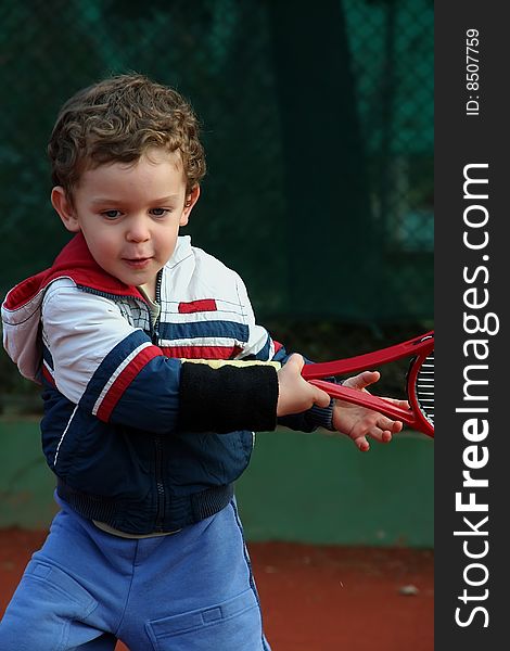 Cute little boy play tennis. Cute little boy play tennis