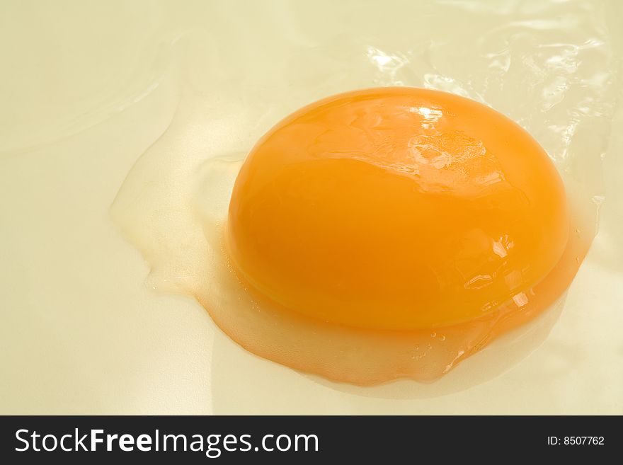 An egg yolk. highkey macro with limited depth of field