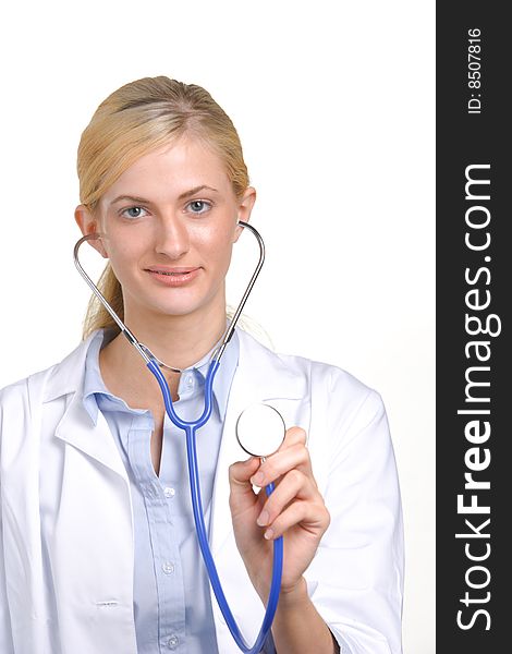 Woman doctor holding stethiscope isolated on white